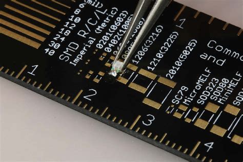 Soldering the surface-mount component in place | Download Scientific ...