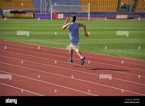 Man Running Fast In Road Stamina And Endurance Stock Photo Alamy