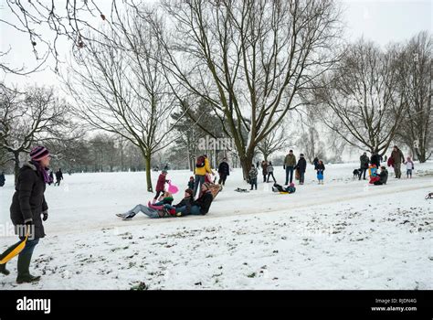 A Snowy Day At Finsbury Park Haringey London With Families Enjoying