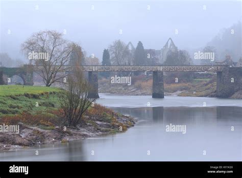 Tintern Abbey And The Wire Bridge Looking Down The River Wye Tintern