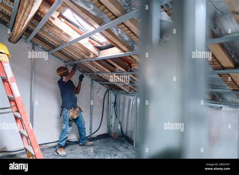 Mature Worker Working At Construction Site Stock Photo Alamy