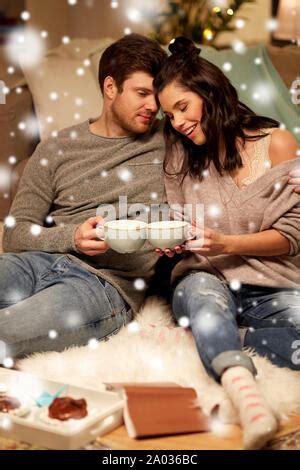 Happy Couple Drinking Hot Chocolate On White Background Stock Photo Alamy