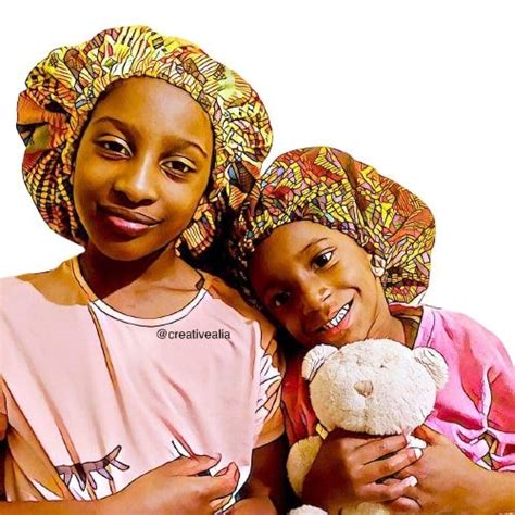 Children Wearing Handmade Handcrafted African Print Satin Lined Bonnets