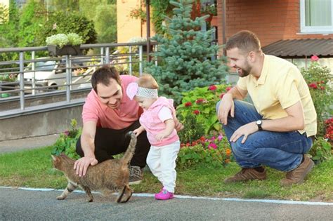 Premium Photo Male Gay Couple With Adopted Baby Girl Outdoors