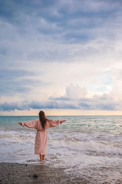 Premium Photo Woman Laying On The Beach Enjoying Summer Holidays