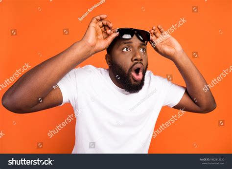 Black Man Yelling Orange Background Over Royalty Free Licensable