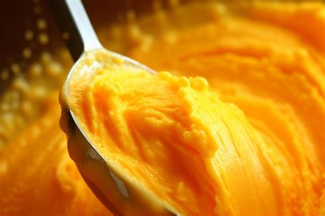 A Scoop Of Orange Sherbet Premium Ai Generated Image