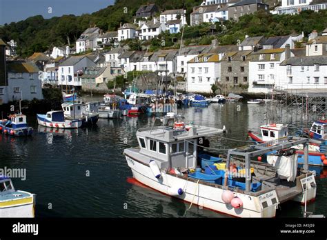 Polperro Harbour With Fishing Boats Stock Photo Alamy