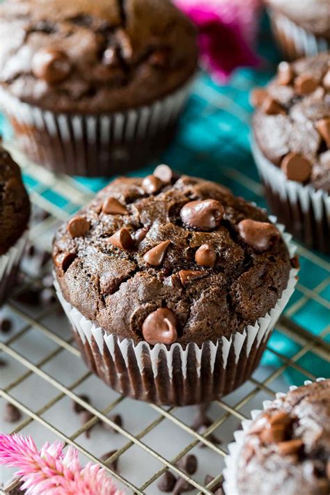 Close Up Overhead View Of A Chocolate Muffin With Chocolate Chips On A