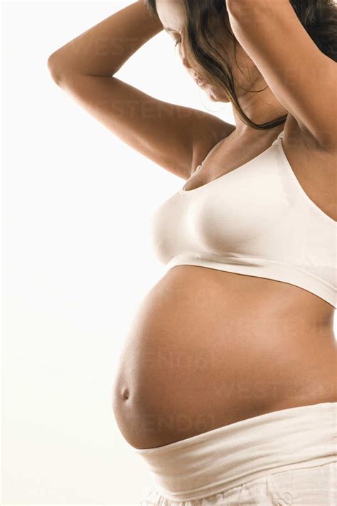 Pregnant Woman Midsection Side View Stock Photo