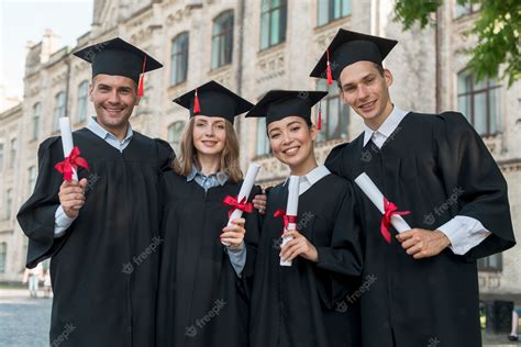 Premium Photo | Portrait of group of students celebrating their graduation