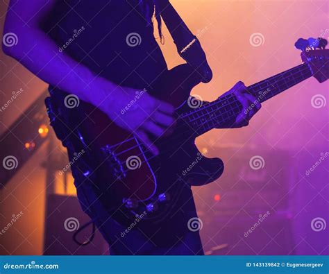 Electric Bass Guitar Player On A Stage Stock Photo Image Of