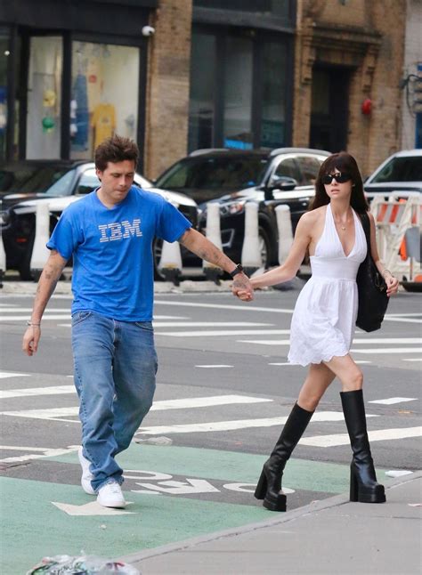 Nicola Peltz In A White Dress And Towering Platform Boots Manhattans