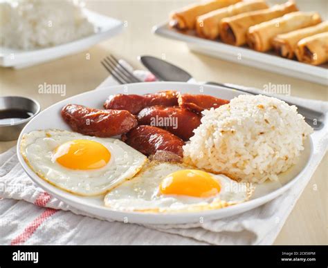 Filipino Silog Breakfast With Garlic Fried Rice Longsilog And Two