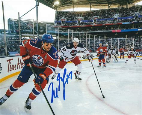 Autographed MILAN LUCIC 8X10 Edmonton Oilers Photo - Main Line Autographs