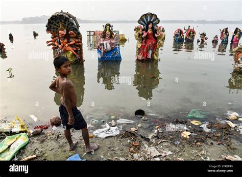 guwahati assam india  mar   boy standing   immersed