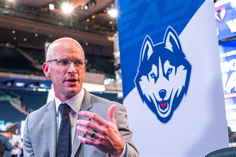 UConn men's basketball unveiling title banner, focusing on new season