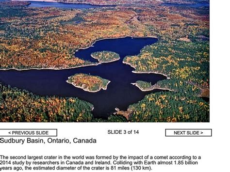 An Aerial View Of Some Water And Land In The Canadian Wilderness With