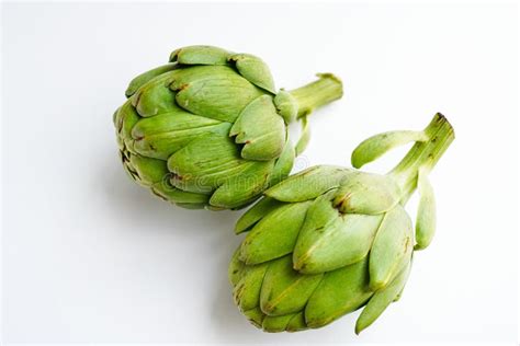 Closeup Of Artichokes On White Background Stock Photo Image Of Fresh