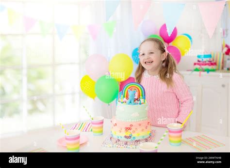 Kids birthday party with colorful pastel decoration and unicorn rainbow ...