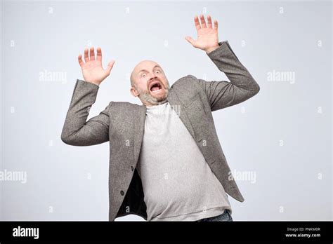 Closeup Portrait Of Shocked Stunned Surprised Mature Man In Casual Suit