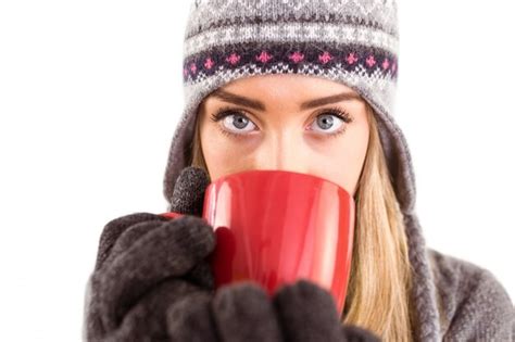 Premium Photo Happy Blonde In Winter Clothes Holding Mug