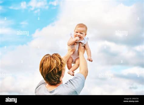 Baby And Man Hi Res Stock Photography And Images Alamy