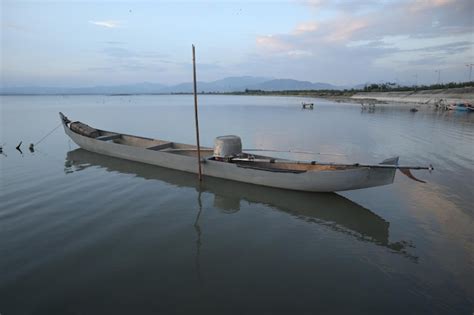 Premium Photo Boat In The Lake At Sunset Rowing Boat Floating Over