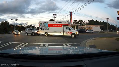 Biker Has Close Call With Oncoming Truck On Narrow Mountain Road