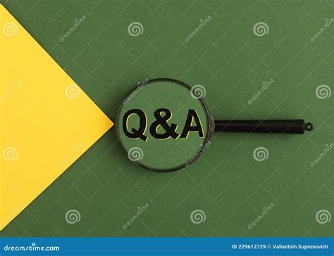 Qna Acronym Through Magnifying Glass On Green And Brown Paper Top View Concept Of Eco