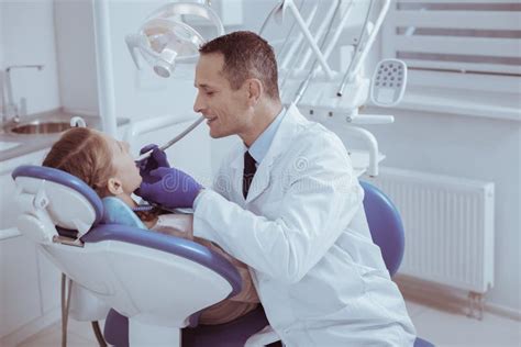 Gay Male Dentist Displaying Teeth Cleaning Stock Photo Image Of Medicine Doctor