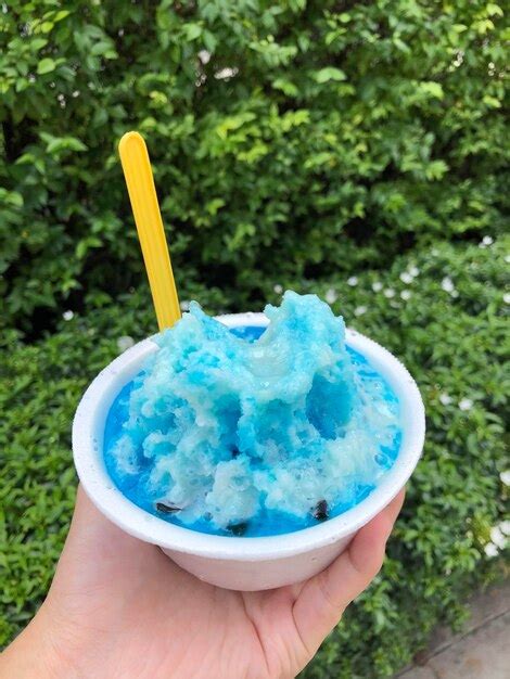 Premium Photo Cropped Image Of Person Holding Ice Cream