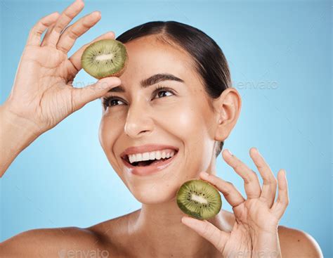 Kiwi Skincare And Woman Isolated On Studio Background For Natural