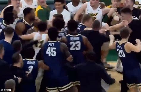 NCAA basketball game erupts into brawl after Oral Roberts' coach ...