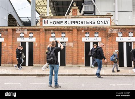 Supporters Outside The Turnstiles At Craven Cottage The Home Of Fulham