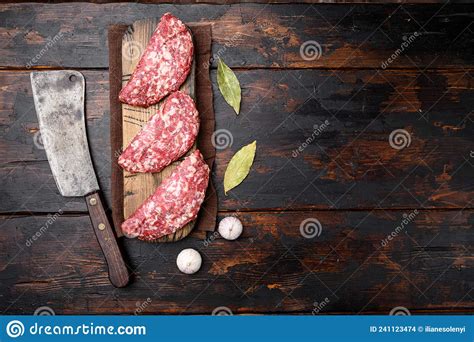 Raw Minced Beef Patties On Old Dark Wooden Table Background Top View Flat Lay With Copy Space