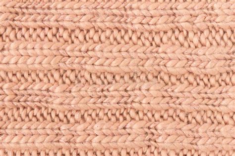 Brown Knitting Pattern Or Knitted Pattern Background Close Up View