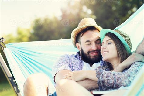 Romantic Couple Relaxing In Hammock 15852383 Stock Photo At Vecteezy