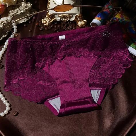 Femmes Sexy caleçons couleur unie dentelle creux épissure dames culottes slips érotique Lingerie