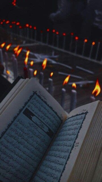 An Open Book With Flames In The Background