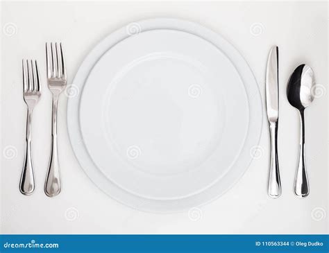 Table Setting With Plate Forks Knife And Spoon Stock Photo Image Of