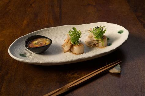 Pan Fried Abalone And Scallop With Diced Vegetables And Yuzu Dressing