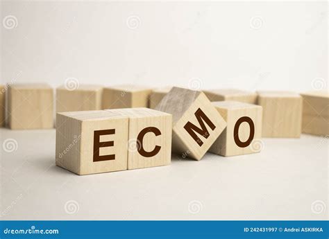 Ecmo Word Written On Wooden Blocks And Stethoscope On Light Blue