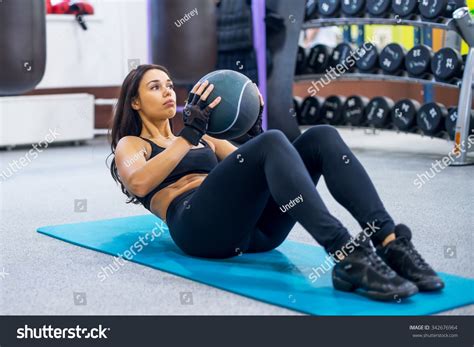 Work Out Fitness Woman Doing Sit Ups Abs Abdominal Crunches Core Exercises With Medecine Ball