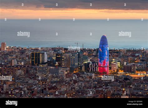 Scenic aerial view of Barcelona city skyscraper and skyline at night in ...