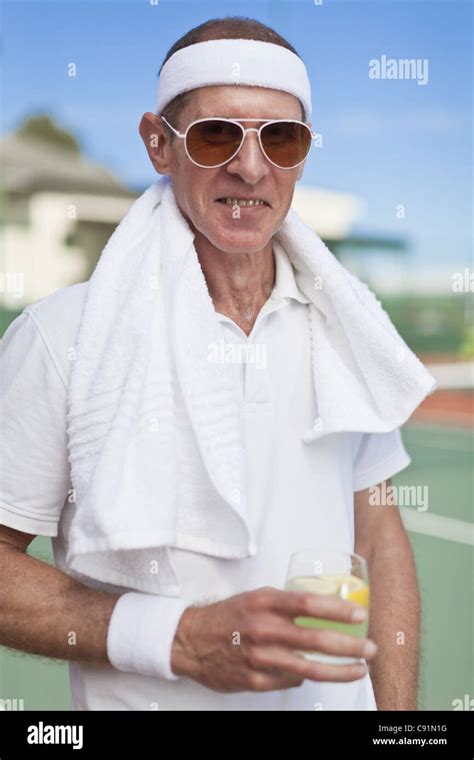 Older Man Drinking Lemonade Outdoors Stock Photo Alamy