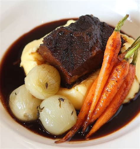 Short Rib With Butter Mashed Potato Roasted Carrots And Braised Onions