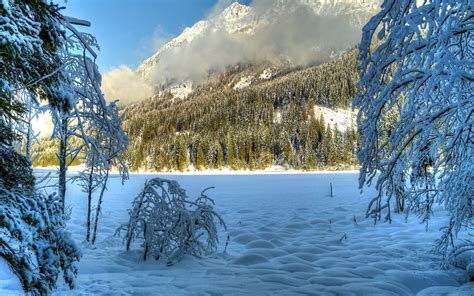 Snow Field With Green Mountain View Hd Wallpaper Wallpaper Flare