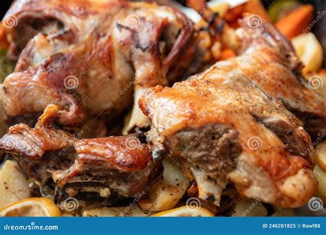 Lamb Leg With Bone Baked With Potato And Herb In Oven Traditional Greek Easter Food Close Up