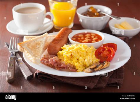 Full English Breakfast With Scrambled Eggs Bacon Sausage Beans